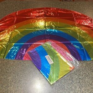 Rainbow shape 32” Mylar balloon multi color.  New in plastic never opened